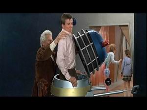 Doctor helps Ian into a Dalek case
