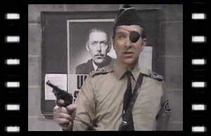 Image of Brigadier Lethbridge-Stewart with fascist poster in background