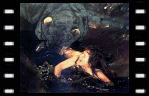 Image of  Leela in the sewers attacked by the Giant Rat (Stuart Fell)