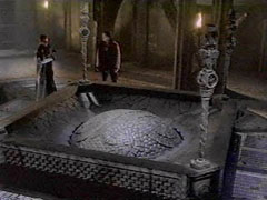 Image from Enemy Within showing The Master, Chang Lee next to the Eye of Harmony