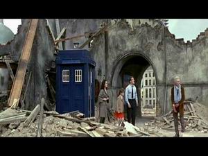 Doctor, Tom and Susan outside the TARDIS